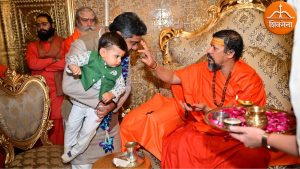 dr abhishek verma with his son and mahamandleshwar